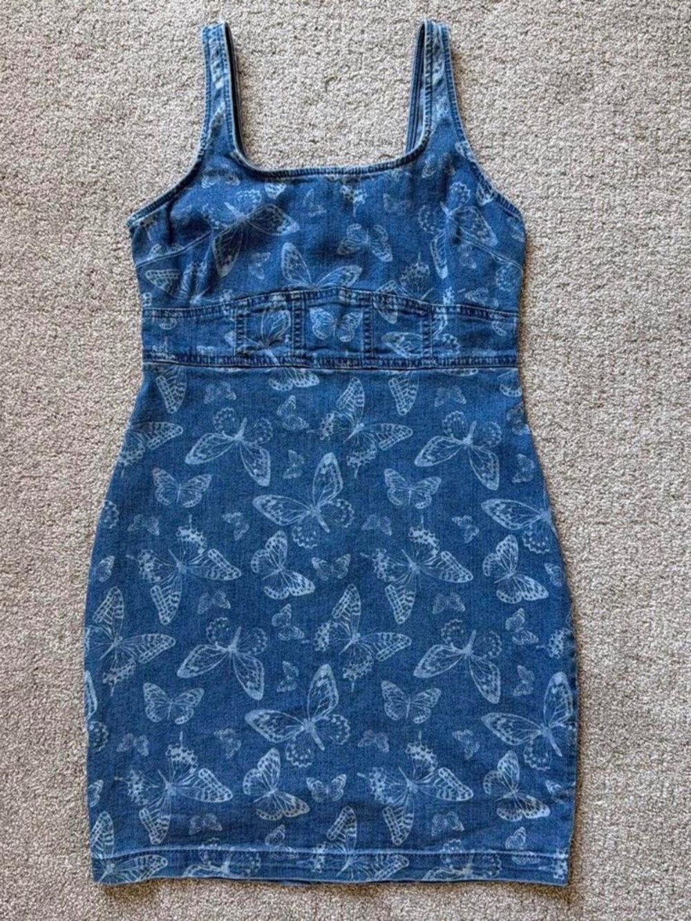 Blue denim mini dress with white butterfly print